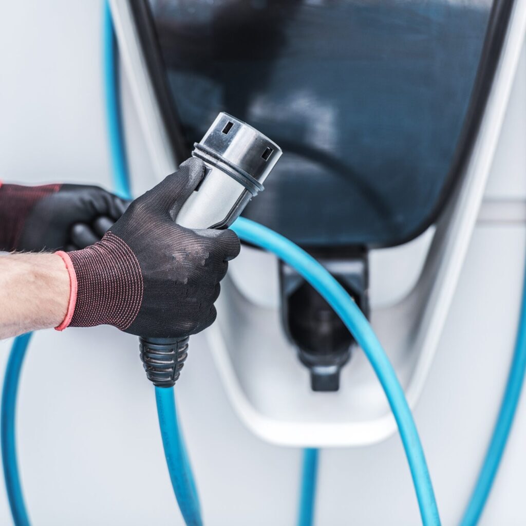 Electric vehicle plugged into a home charger