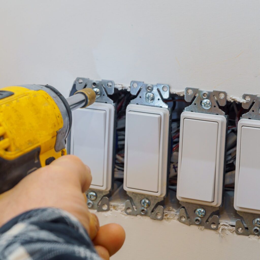 stock image of light switches being installed
